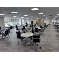 Aura executive medium back with 900mm diamter tops and brushed steel base