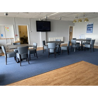 Grey cafe chairs with grey tables